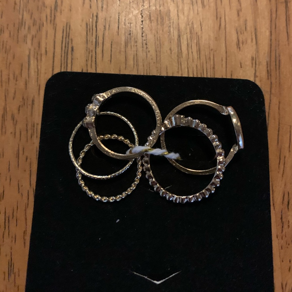 New gold tone set of 5 rings.